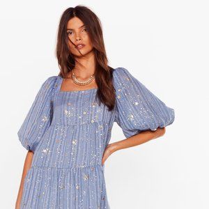 Celestial blue dress with gold shimmer and puff sleeve